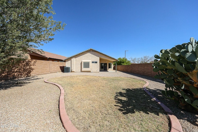 28604 N 21st Ln, Phoenix, AZ 85085 - rear view of property featuring a fenced backyard, central air condition unit, stucco siding, and a patio