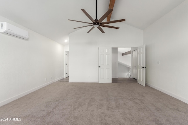 10338 E San Salvador Dr, Scottsdale, AZ 85258 - carpeted empty room with an AC wall unit, ceiling fan, high vaulted ceiling, and baseboards