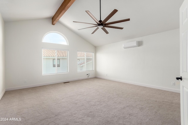 10338 E San Salvador Dr, Scottsdale, AZ 85258 - carpeted spare room featuring a wall unit AC, ceiling fan, beamed ceiling, baseboards, and high vaulted ceiling