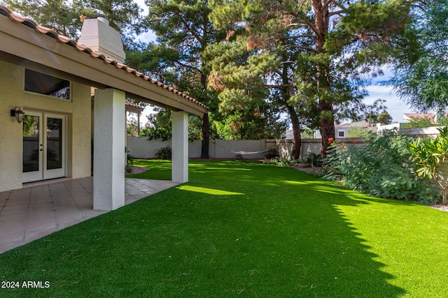 10338 E San Salvador Dr, Scottsdale, AZ 85258 - view of yard featuring a patio and french doors