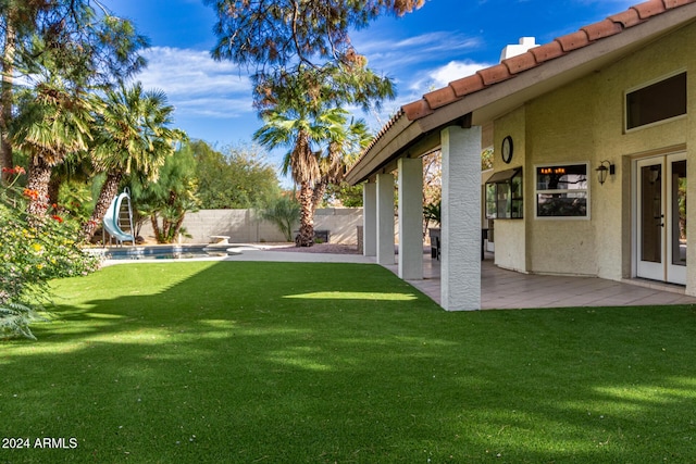 10338 E San Salvador Dr, Scottsdale, AZ 85258 - view of yard with a patio and french doors