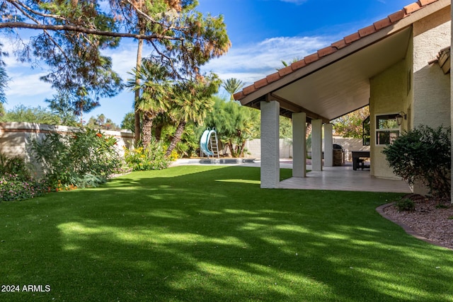 10338 E San Salvador Dr, Scottsdale, AZ 85258 - view of yard featuring a patio