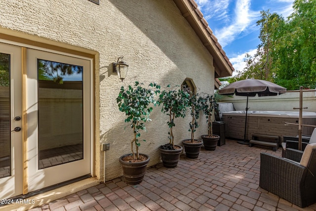 10338 E San Salvador Dr, Scottsdale, AZ 85258 - view of patio / terrace with a hot tub