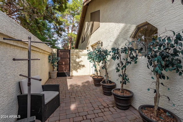10338 E San Salvador Dr, Scottsdale, AZ 85258 - view of patio / terrace featuring a gate and fence