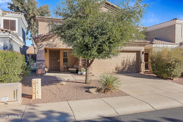 view of front of property featuring a garage