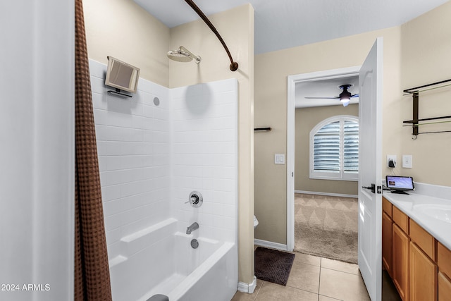 bathroom with vanity, ceiling fan, tile patterned flooring, and shower / bathtub combination with curtain