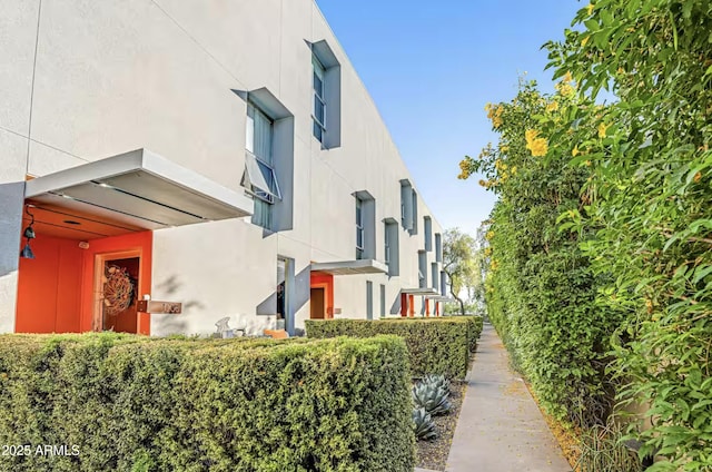 view of home's exterior with stucco siding