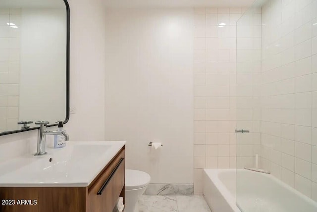 bathroom with marble finish floor, shower / tub combination, vanity, and toilet