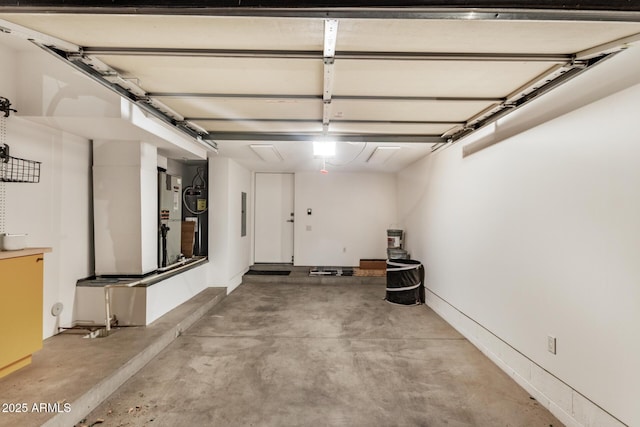 garage featuring baseboards