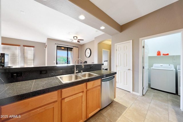 16600 N Thompson Peak Pkwy Unit 2006, Scottsdale, AZ 85260 - kitchen with stainless steel dishwasher, tile countertops, a sink, washing machine and dryer, and recessed lighting