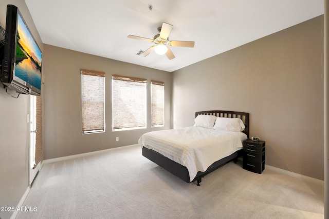 16600 N Thompson Peak Pkwy Unit 2006, Scottsdale, AZ 85260 - carpeted bedroom featuring baseboards and ceiling fan