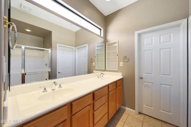 16600 N Thompson Peak Pkwy Unit 2006, Scottsdale, AZ 85260 - full bath featuring tile patterned floors, a stall shower, double vanity, and baseboards