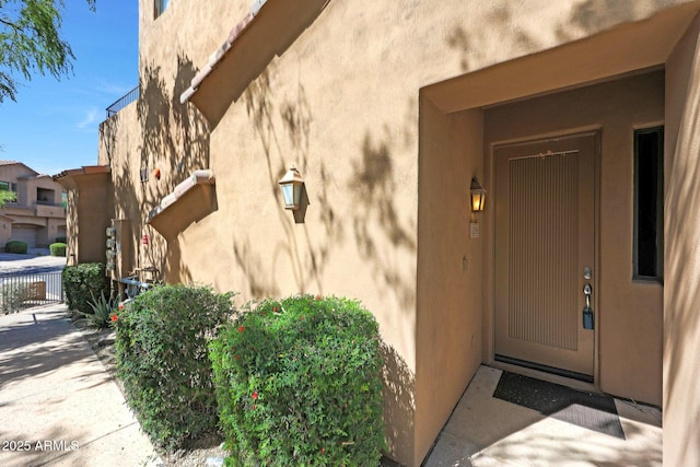 16600 N Thompson Peak Pkwy Unit 2006, Scottsdale, AZ 85260 - property entrance with stucco siding