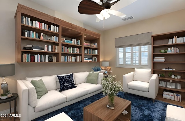 living room with ceiling fan