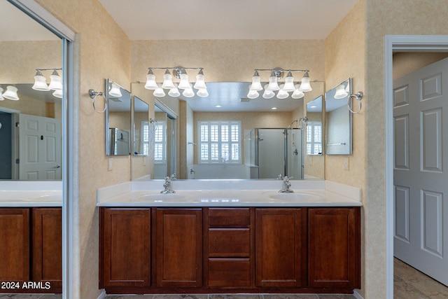 bathroom with dual vanity and tile floors