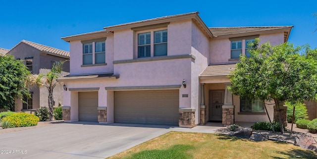 view of front of home with a garage