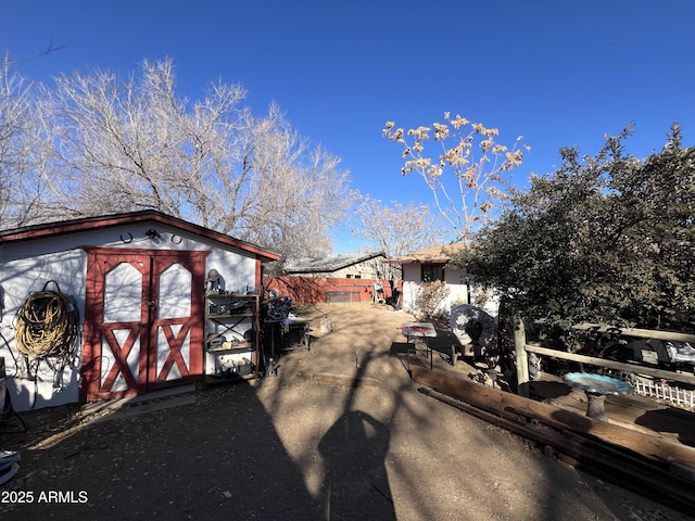 exterior space featuring a storage shed