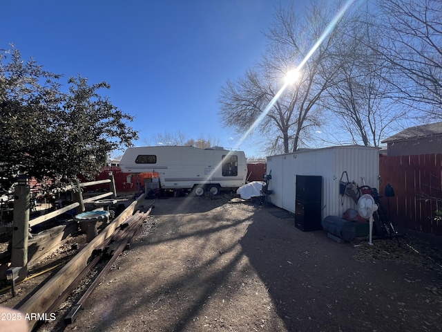 exterior space featuring a shed