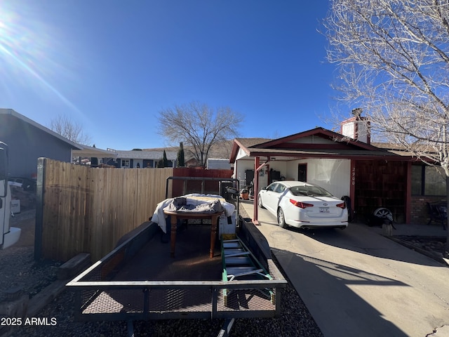 view of side of home with a garage