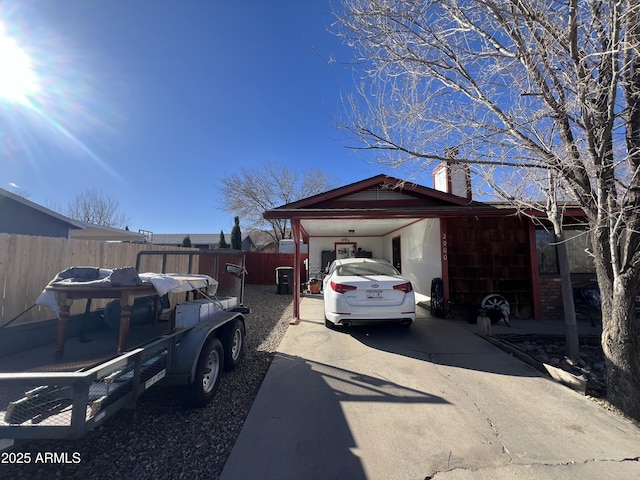 exterior space with a carport