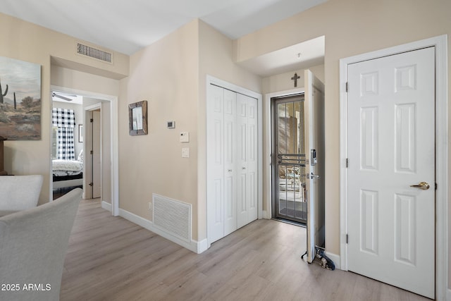 entrance foyer with light wood-type flooring