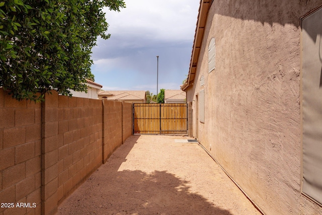fenced backyard featuring a patio area