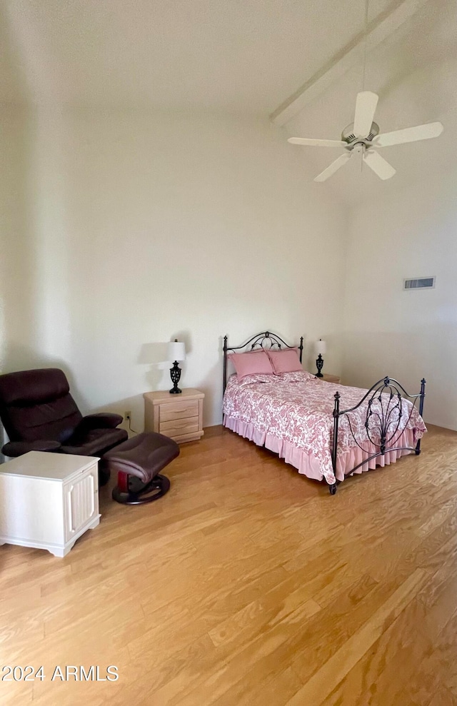 bedroom featuring ceiling fan and light hardwood / wood-style flooring