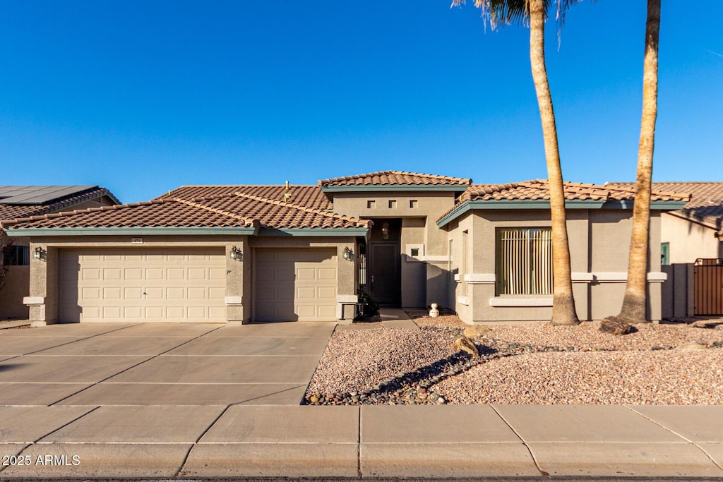 view of front of home with a garage