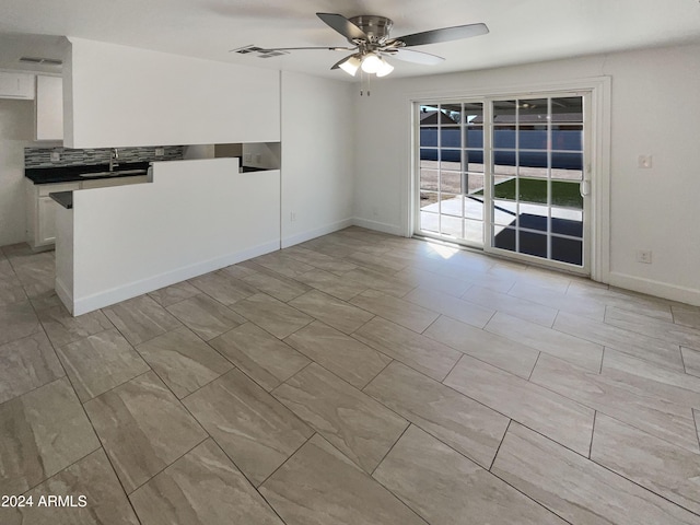 spare room featuring ceiling fan