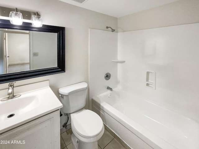 full bathroom with tile patterned flooring, vanity, tub / shower combination, and toilet