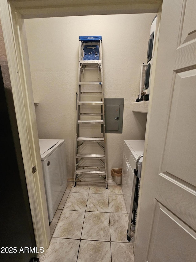 laundry area with separate washer and dryer and electric panel