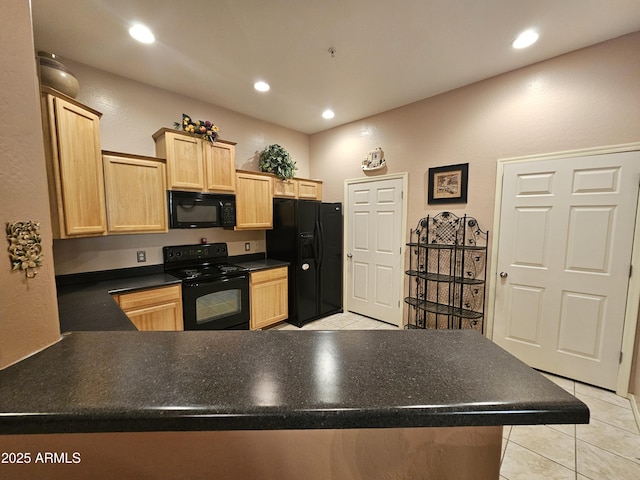 kitchen with kitchen peninsula, light tile patterned floors, light brown cabinets, and black appliances