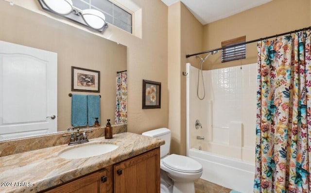 full bathroom featuring shower / tub combo, vanity, and toilet