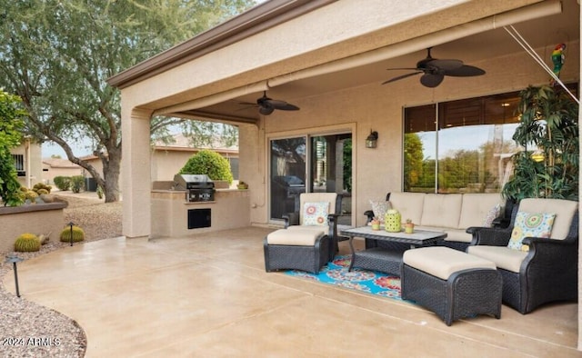 view of patio / terrace with exterior kitchen, ceiling fan, an outdoor hangout area, and grilling area