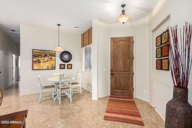 foyer featuring visible vents