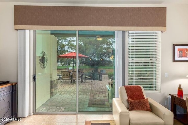 doorway to outside featuring light tile patterned floors