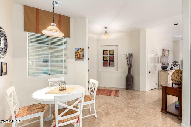 dining space featuring visible vents