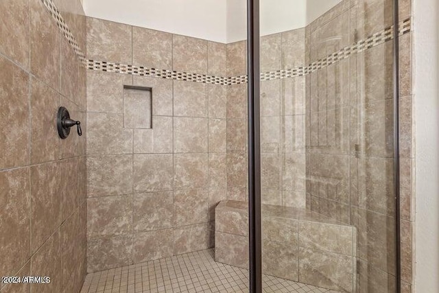 bathroom with a stall shower