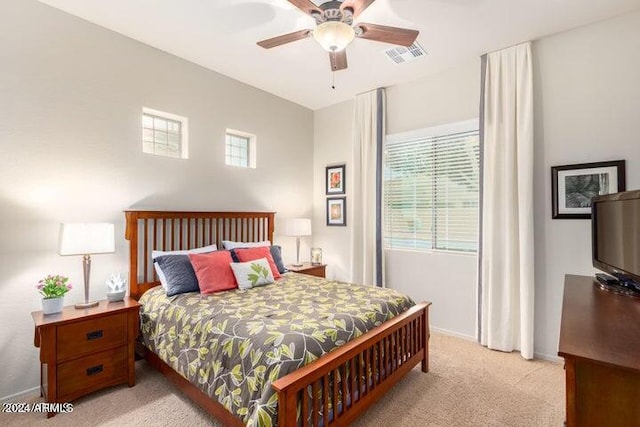 bedroom with a ceiling fan, carpet, visible vents, and baseboards