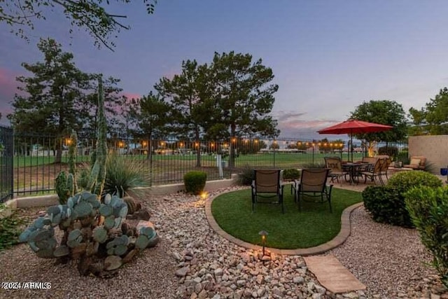 view of yard featuring a patio and fence