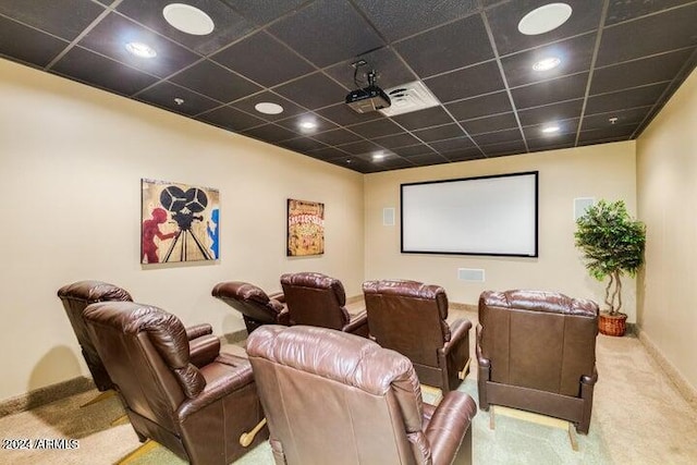 home theater room featuring recessed lighting, carpet flooring, a drop ceiling, and baseboards