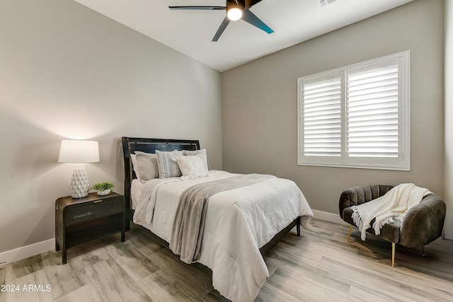 bedroom featuring ceiling fan and light wood-type flooring