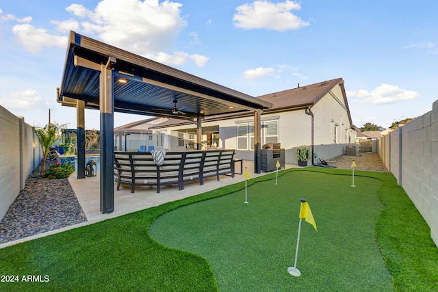 surrounding community featuring an outdoor kitchen