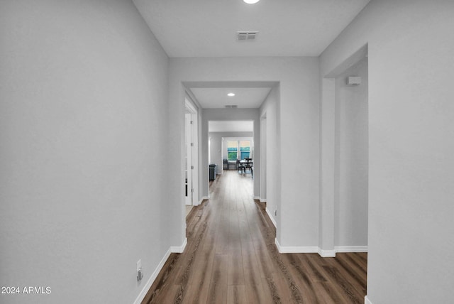 hallway featuring dark hardwood / wood-style floors