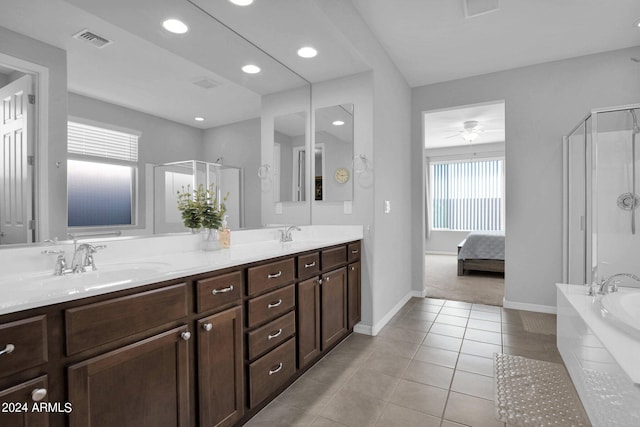 bathroom with ceiling fan, vanity, tile patterned flooring, and separate shower and tub