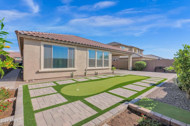 back of property with a patio area