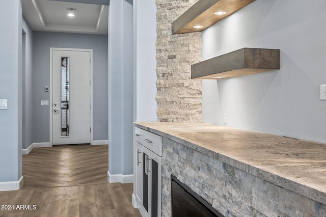 kitchen with a stone fireplace