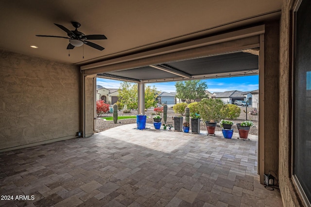 view of patio with ceiling fan