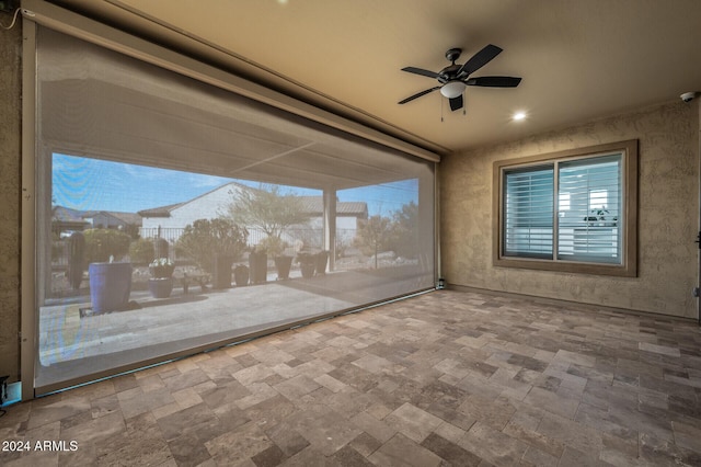 empty room featuring ceiling fan