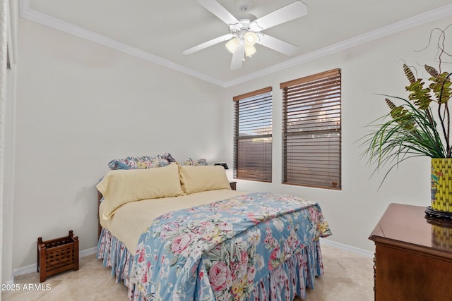 bedroom with ornamental molding and ceiling fan